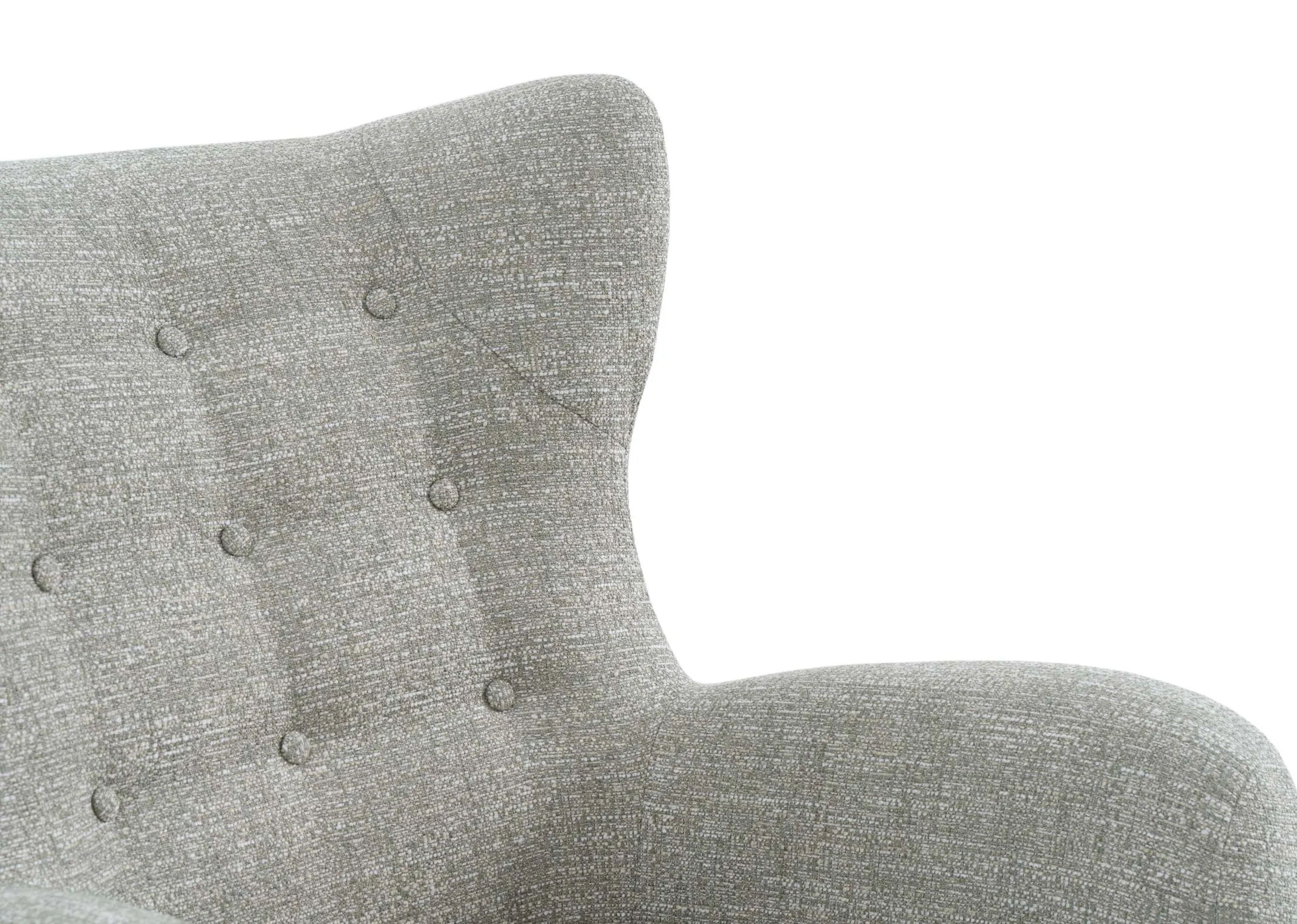 A light green fabric armchair from EZ Livings Bronx range. Closeup of tufted button detail on seat back.