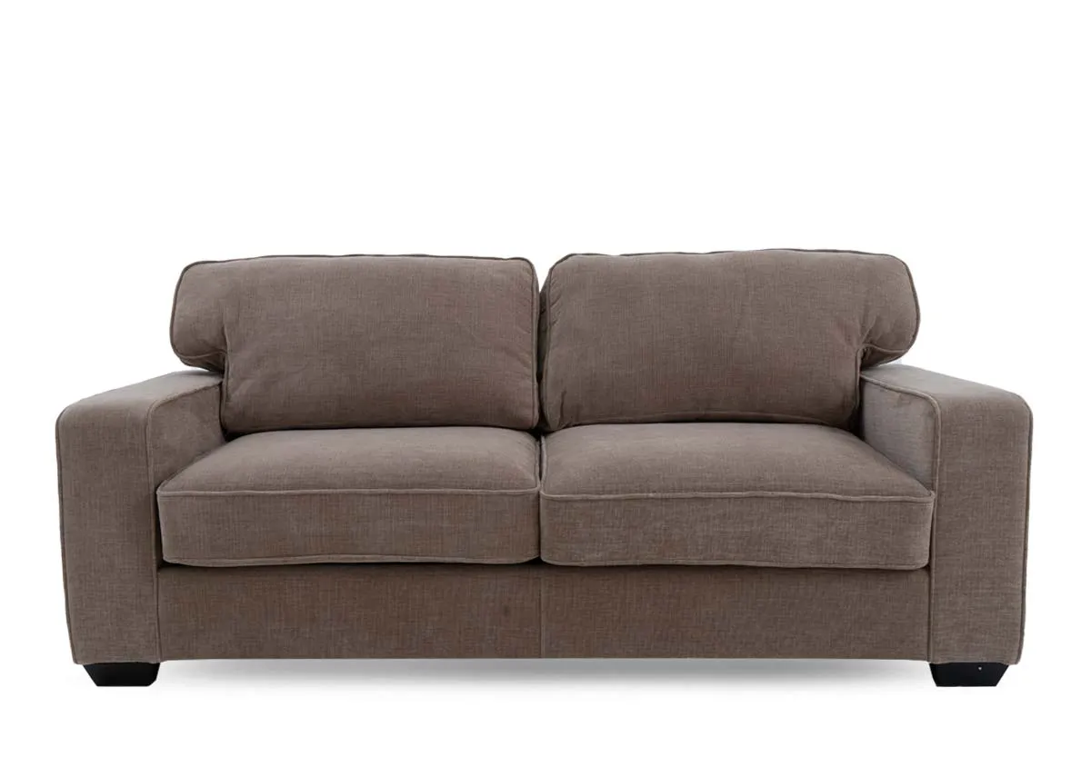 A beige fabric sofa from EZ Living Furnitures Nevada range. Front view of sofa cushions that are removable