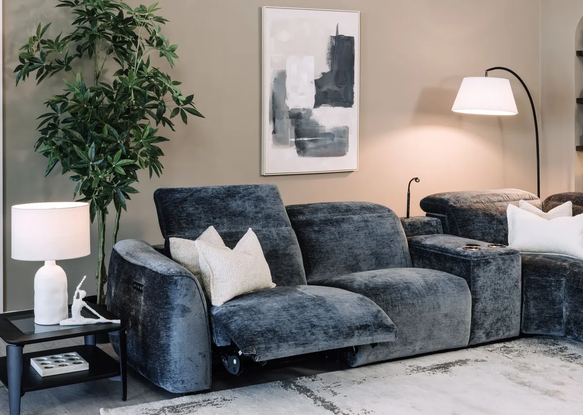 A teal fabric corner sofa with 2 seater corner and 2 seater from EZ Livings Preston range.Back view
