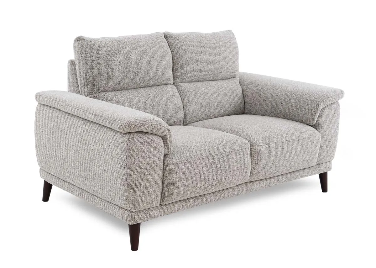 A beige fabric 2 seater sofa from EZ Livings Savoy range. Angled view
