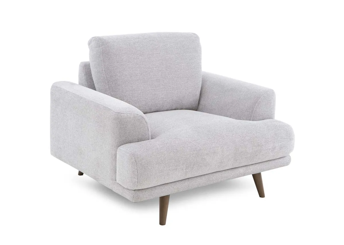 A light grey fabric armchair from EZ Livings Legend range. Angled view of