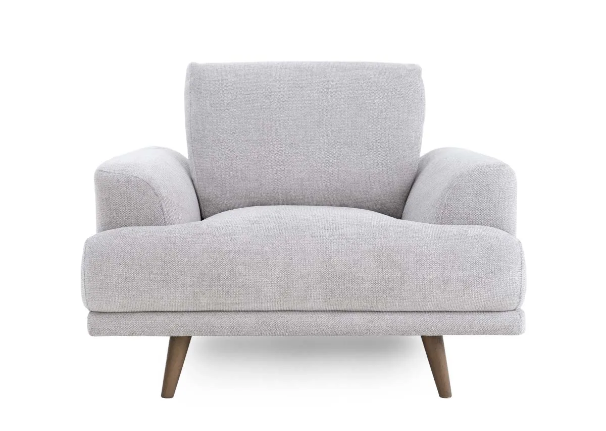A light grey fabric armchair from EZ Livings Legend range. Front view
