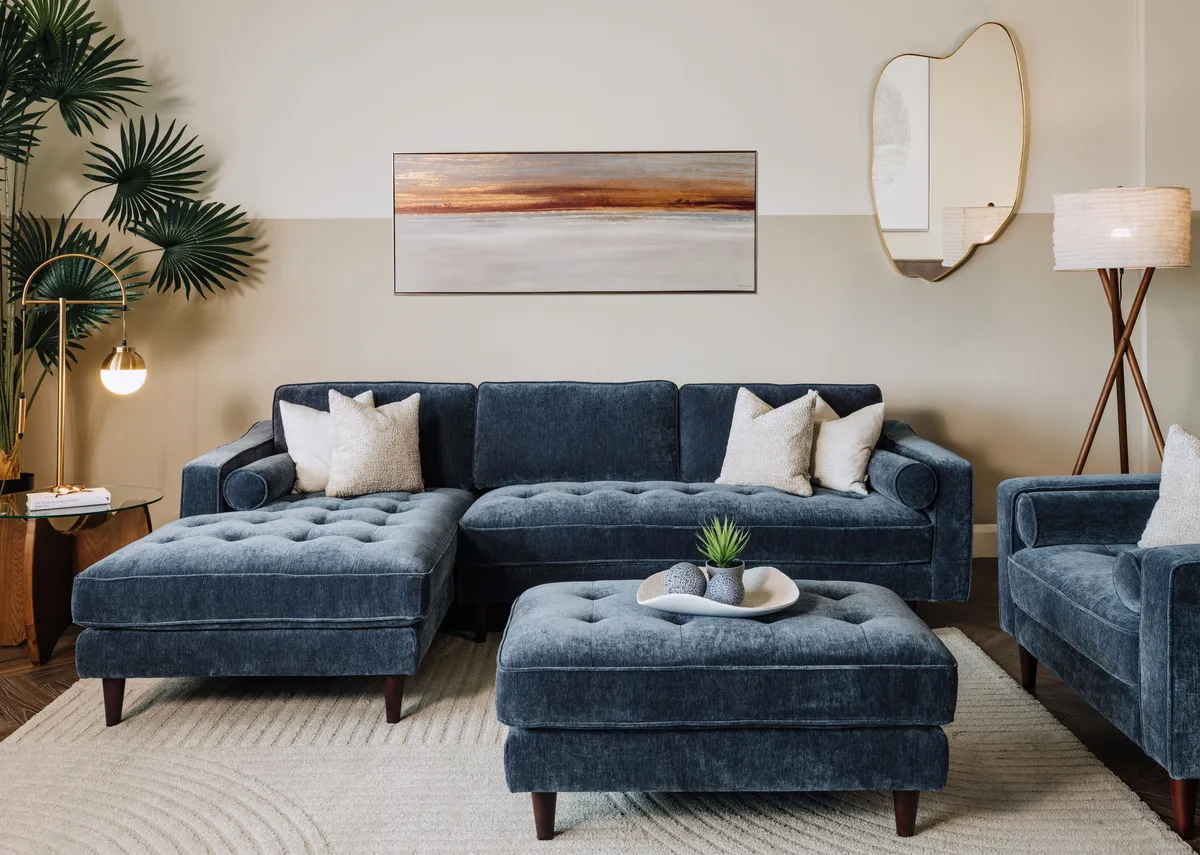 A lifetsyle image of the Genoa chaise with Benton mirror and Evening peace canvas and footstool.