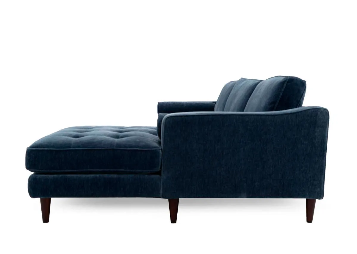 A blue fabric rhf sofa chaise from EZ Livings Genoa range. Side view of low arms