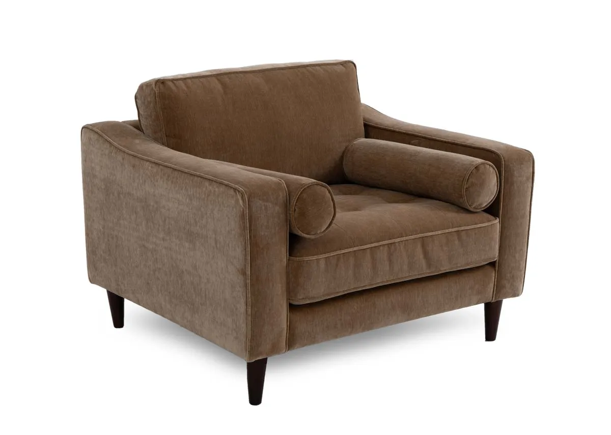 A rich brown fabric armchair from EZ Livings Genoa range. Angeld view of the low arms and 2 cylindrical cushions.