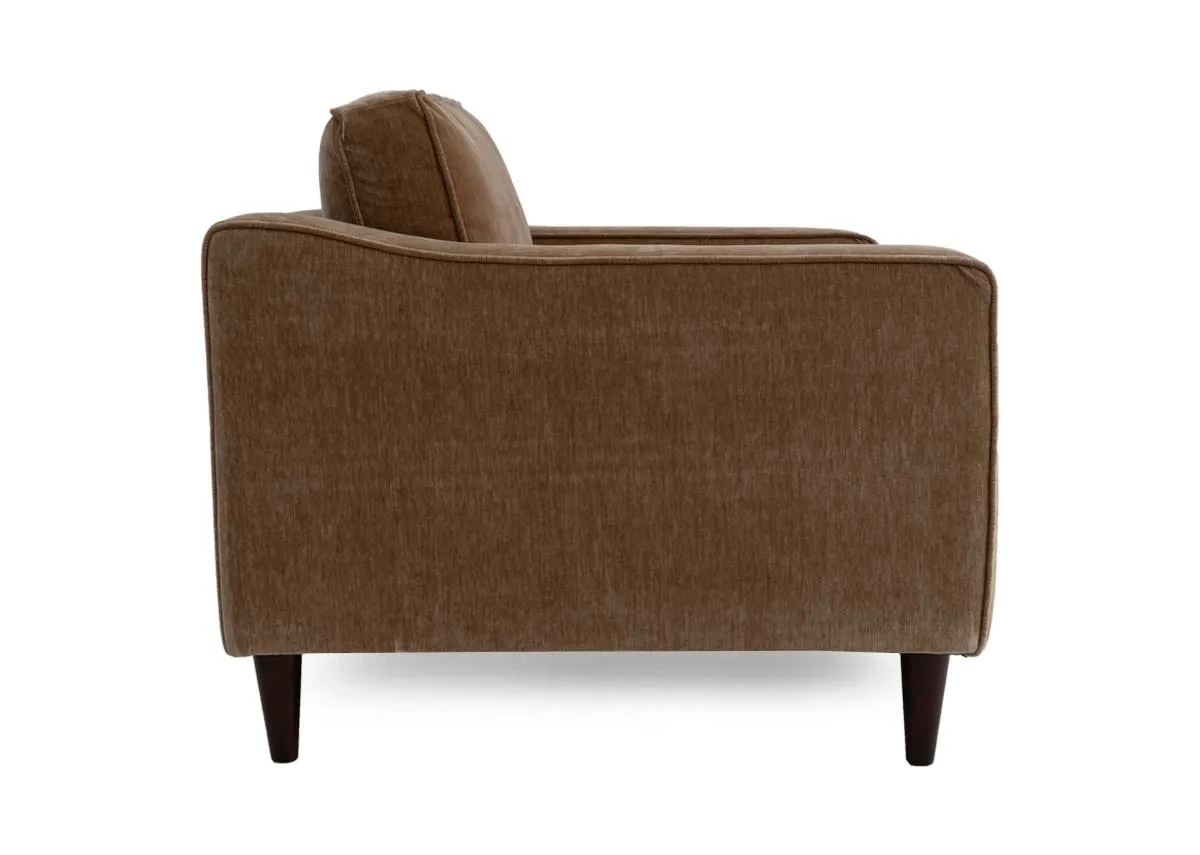 A rich brown fabric armchair from EZ Livings Genoa range. Side view of low arms and walnut feet