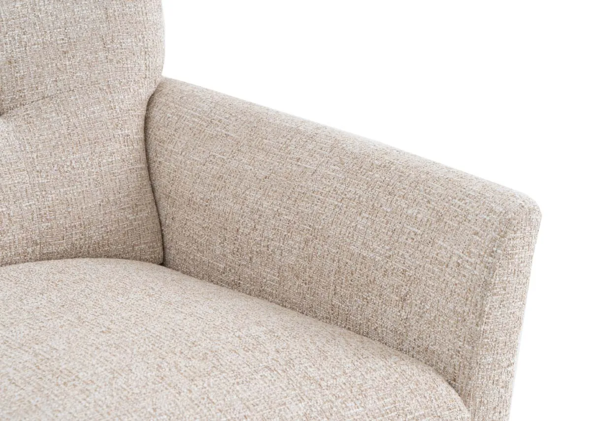 A cream fabric armchair from EZ Livings Ivy range. Closeup of chic fabric