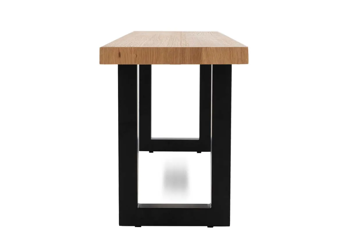 An oak dining bench with black metal base from EZ Livings Montana range.Side view of black rectanular legs