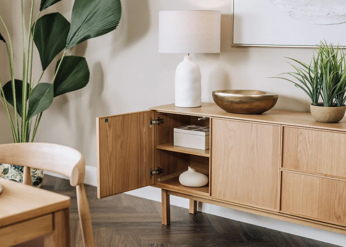 A 3 door 2 drawer oak sideboard from EZ Livings Kari range. Front view