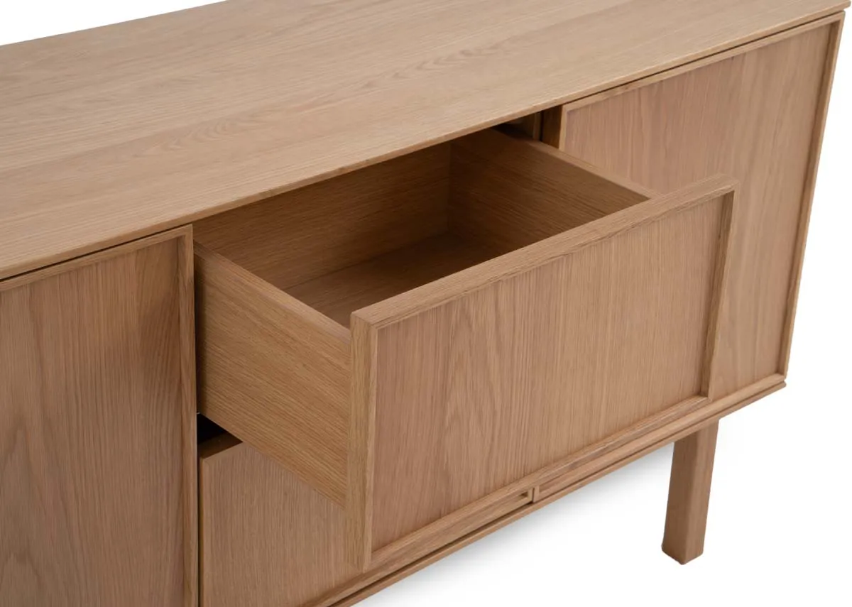 A 3 door 2 drawer oak sideboard from EZ Livings Kari range. Side view