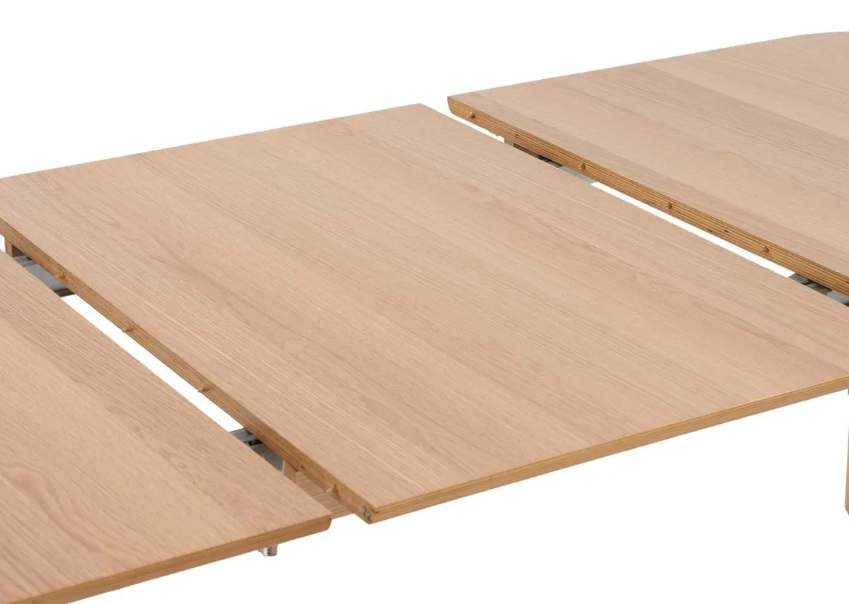 An oak rectangular dining table from EZ Livings Anton range.Closeup of the extension leaf in place