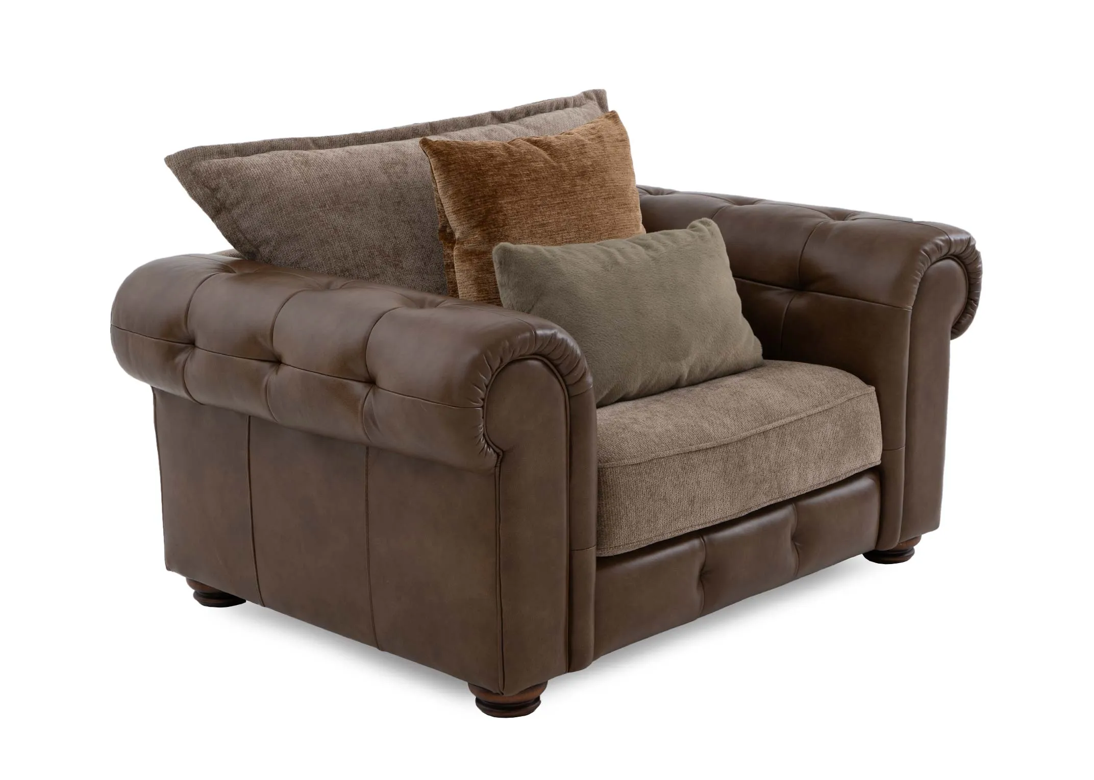 A brown cuddler with leather chesterfield frame and beige fabric seat and back cushion from EZ Livings Nepal range. Angled view or scatter cushion. 