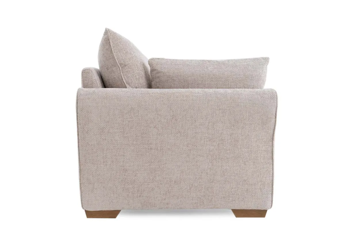 A beige fabric 2 seater sofa from EZ Livings Skyline range.Side view