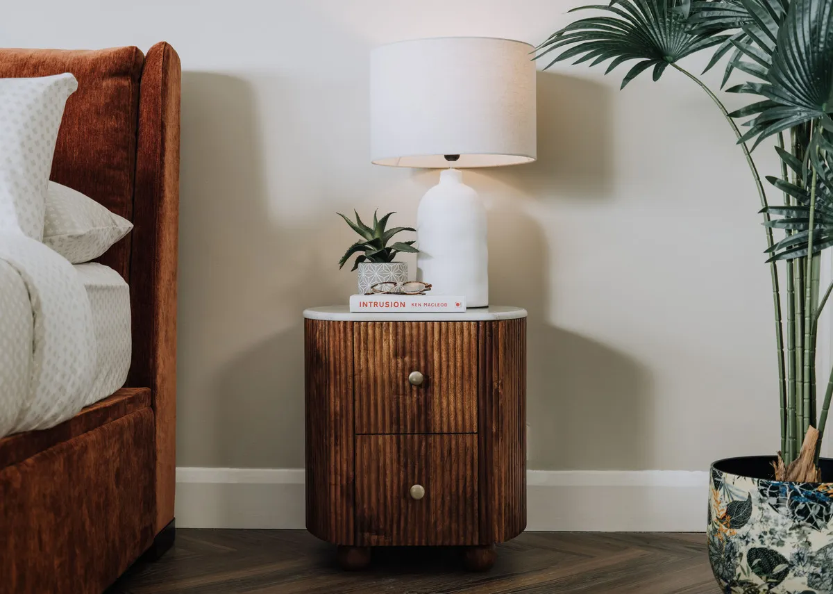 A lifestyle image of the Bunton locker with Feale table lamp