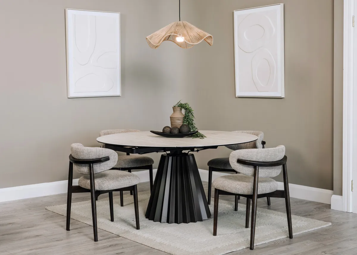 A lifestyle image of the Zenith dining table with Hael chairs and Gateway canvas