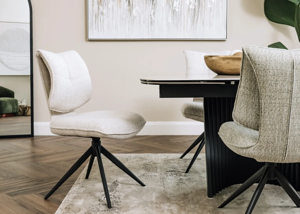 A lifestyle image of the Napoli wheat swivel chair with Napoli table.