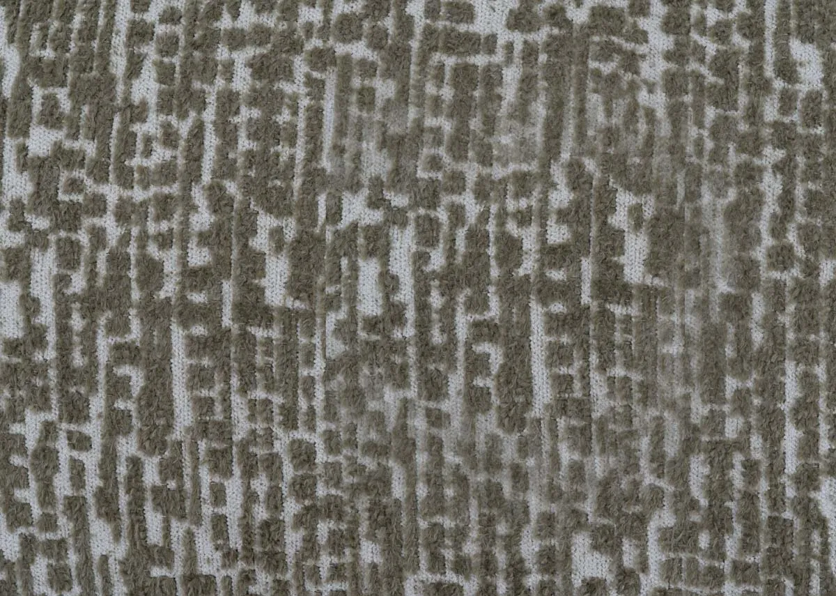 A green and white bolster cushion from EZ Livings Wild Fern range. Closeup of fabric