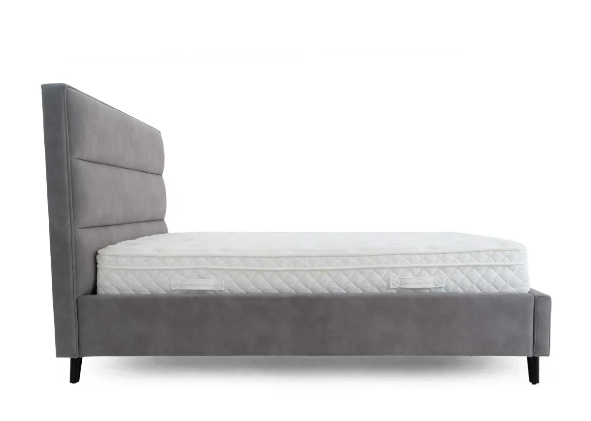 A light grey fabric bedframe from EZ Living Furniture. Side view of upholstery detail