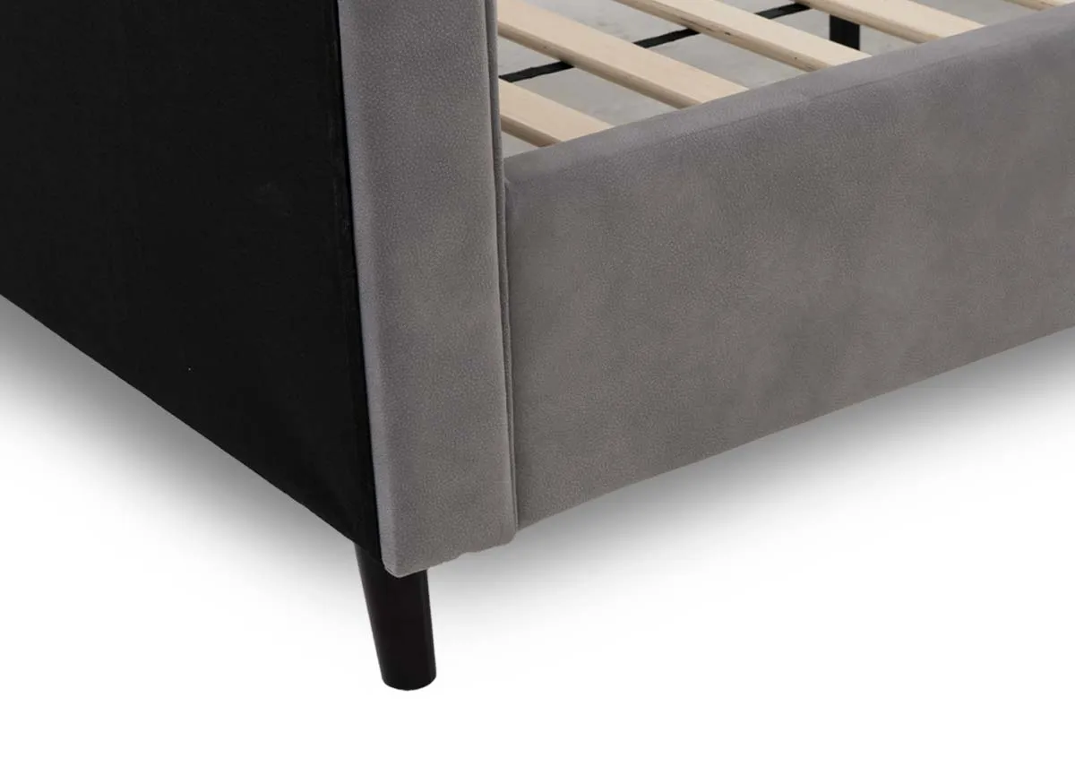 A light grey fabric bedframe from EZ Living Furniture. Closeup of leg rubber black