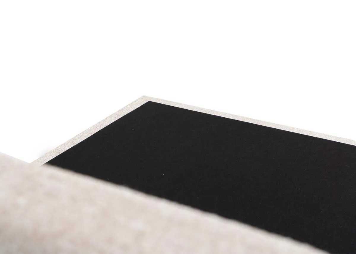 A beige fabric ottoman bed from EZ Livings Liberty range. Closeup of black bed base over frame