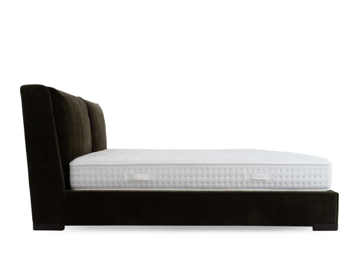 A green fabric bedframe with padded headboard from EZ Livings Comfy range.Side view