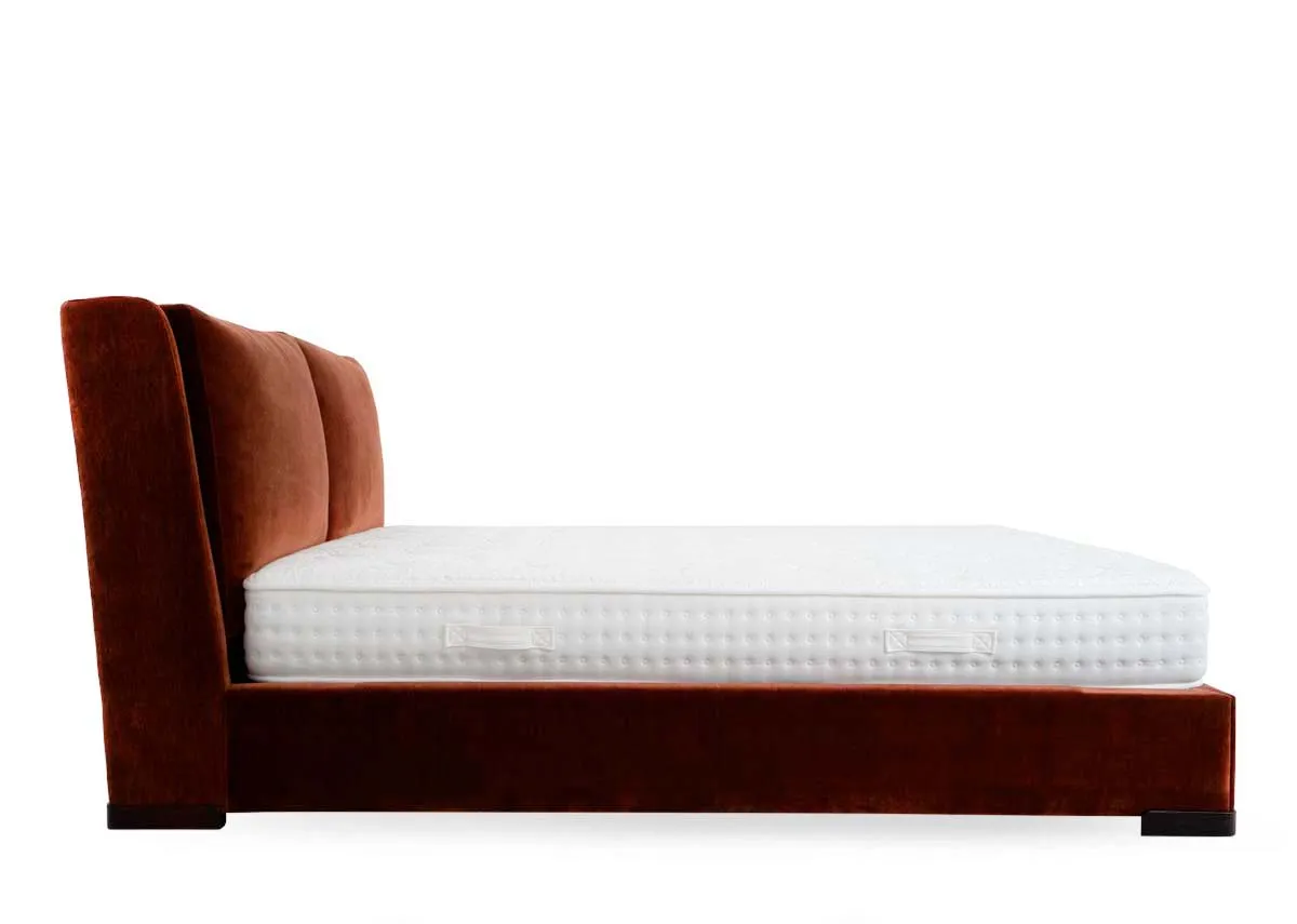 A rust fabric bedframe with high pillowback headboard from EZ Livings Comfy range. Side view of large frame and mattress not included.