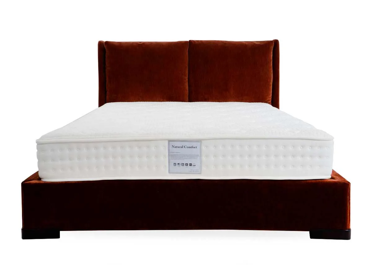 A rust fabric bedframe with high pillowback headboard from EZ Livings Comfy range. Front view of pillow headboard and high finish upholstered frame.