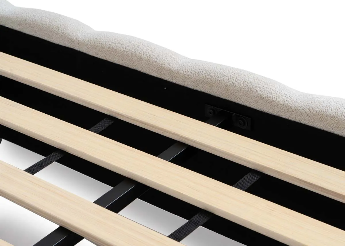 A cream fabric 5ft bedframe from EZ Livings Julia range. Closeup of slat wood panel base