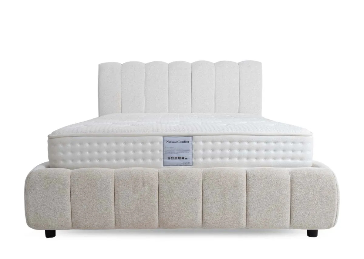 A cream fabric 5ft bedframe from EZ Livings Julia range. Front view of cloudlike bed with mattress not included.