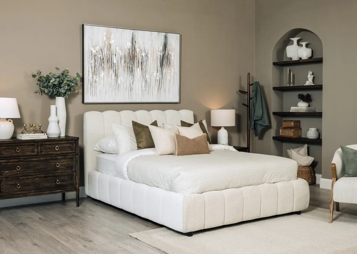A cream fabric 6ft bedframe from EZ Livings Julia range. Front view of cloudlike bed with mattress not included.