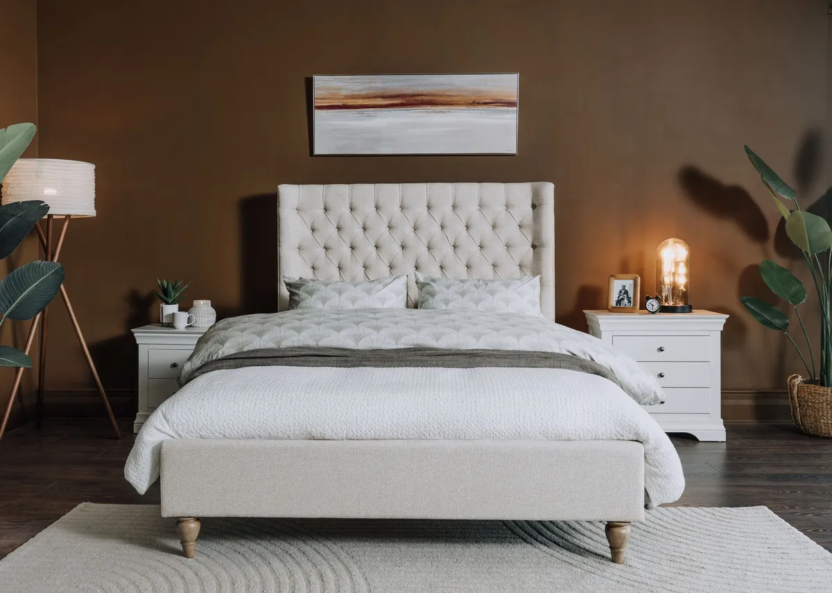 A lifestyle image of the Chelsea bedframe with Evening Peace canvas.
