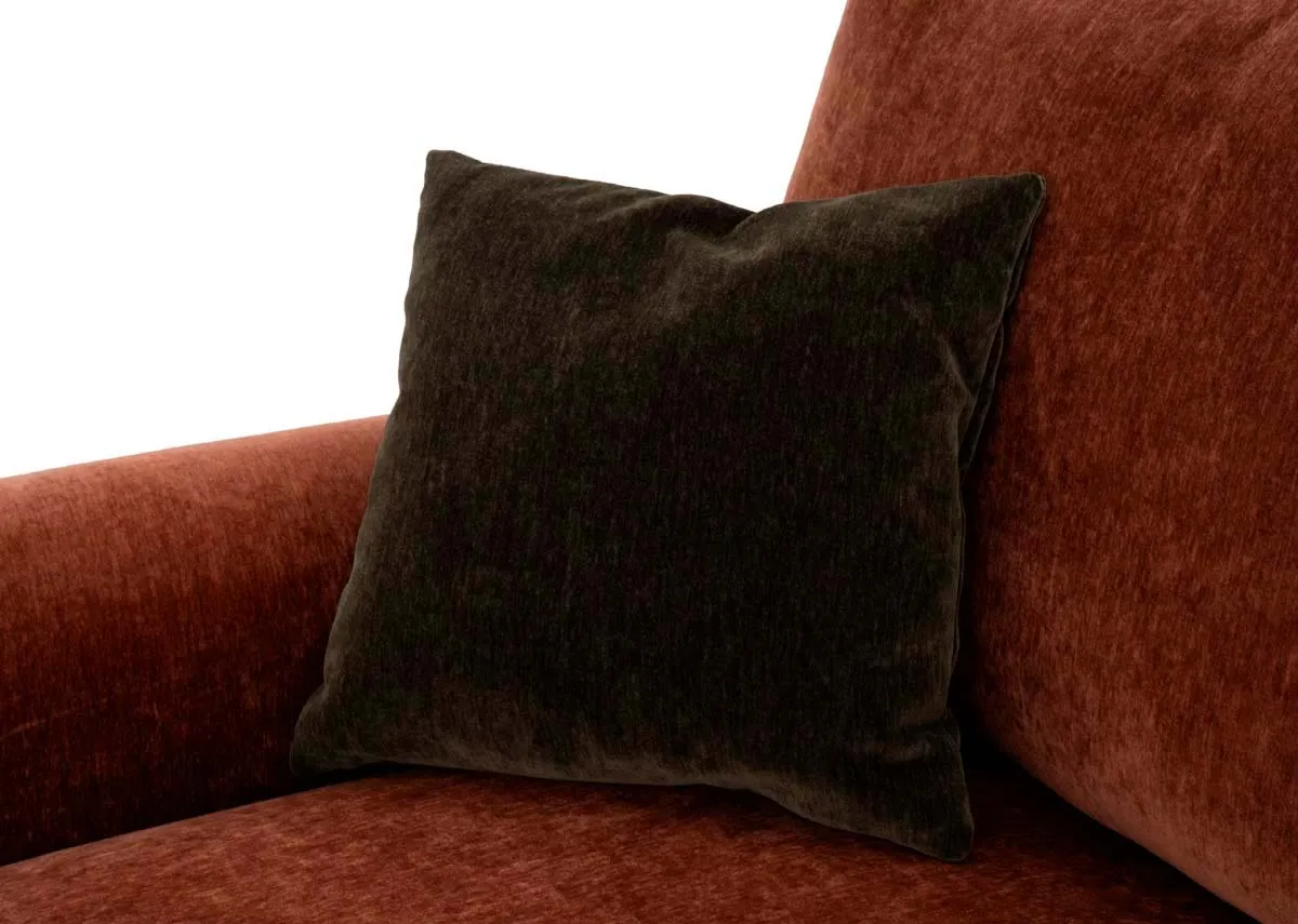 A rust fabric corner sofa from EZ Livings Cotswold range. Closeup of free scatter cushion