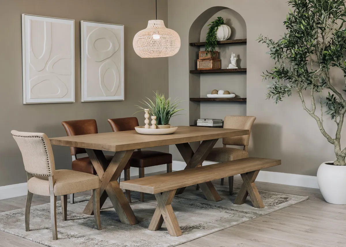 A lifestyle image of the Geneva dining table with the Gateway pictures