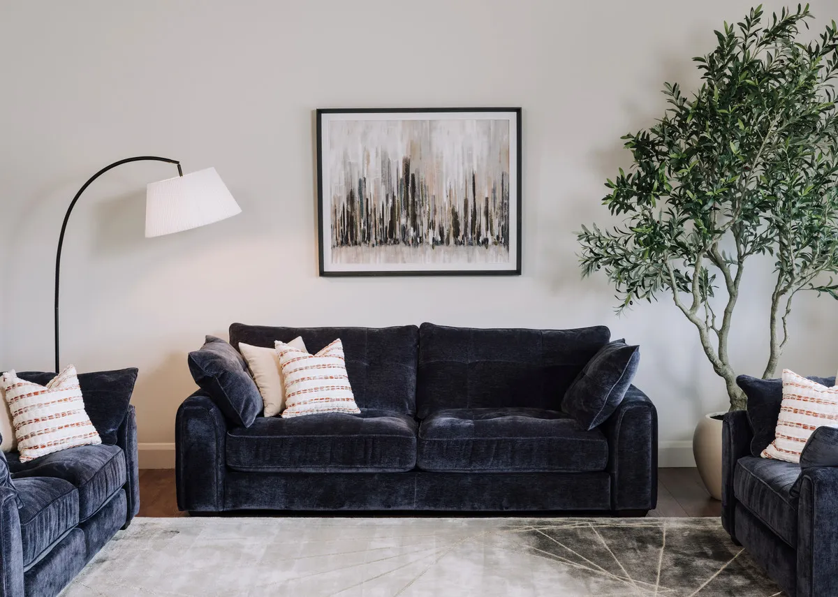 A lifestyle image of the  Darcy sofa with Urban silence print 