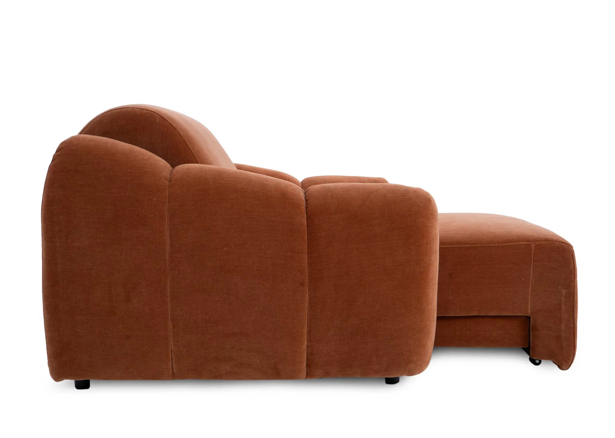 A rust orange armchair from EZ Livings Eleanor range. Side view of tufted detail and stitching  and chaise out