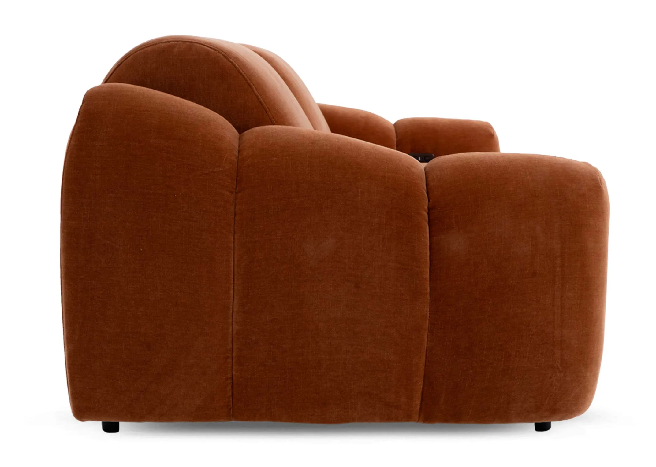 A rust orange 2 seater sofa from EZ Livings Eleanor range. Side view of seam tuft detail as  sofa