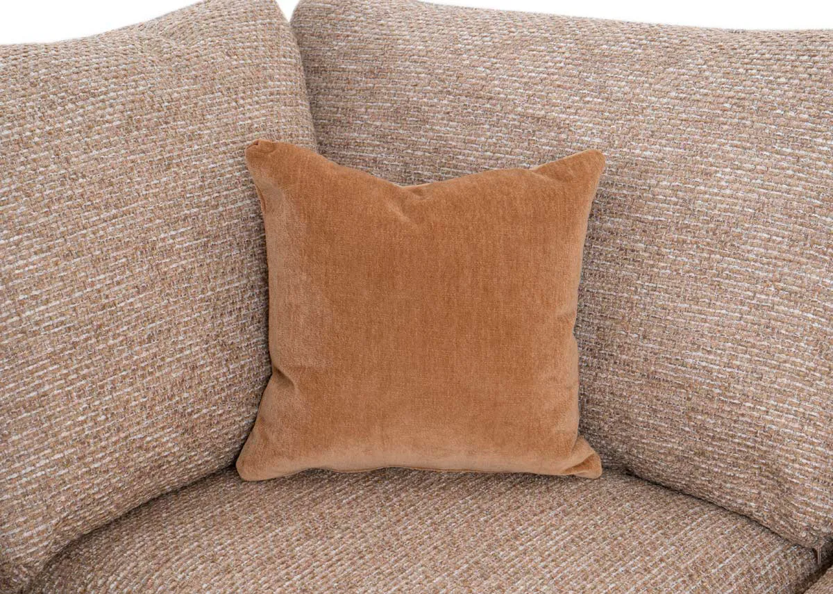A beige fabric corner chaise with a closeup shot of gold scatters.
