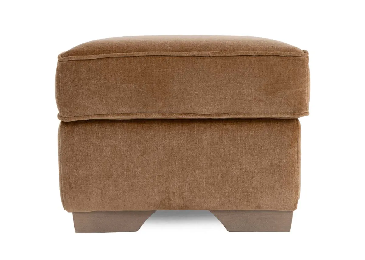 An angled image of the Strata footstool from E Living Furniture. Side view of light wood feet