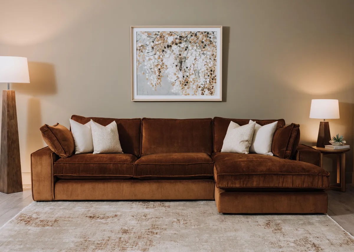 A lifestyle image of the Addison chaise with Woodland warmth canvas with Drift rug.