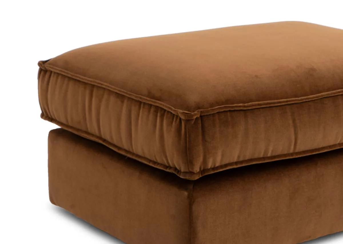 A bronze brown fabric footstool from EZ Livings Addison range. Closeup of bronze velvet fabric