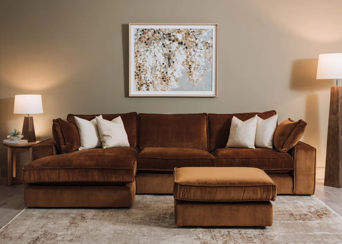 A lifestyle image of the Addison chaise with Woodland warmth canvas with Drift rug.