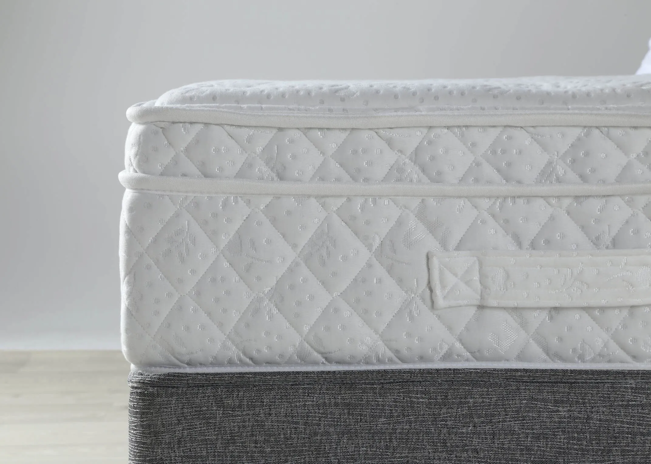 A close up image of the Emilys Dream 4 foot double mattress on a bed.