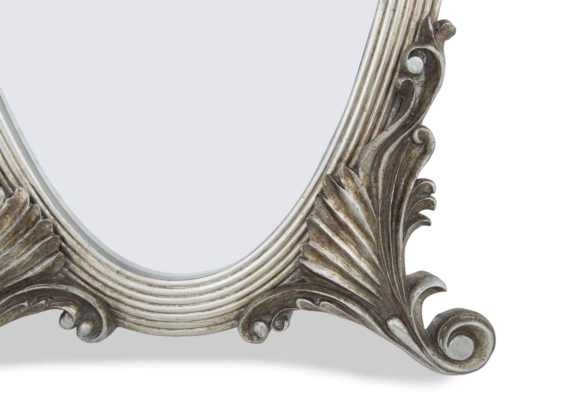 A lifestyle image of the antique styled Lana tall mirror