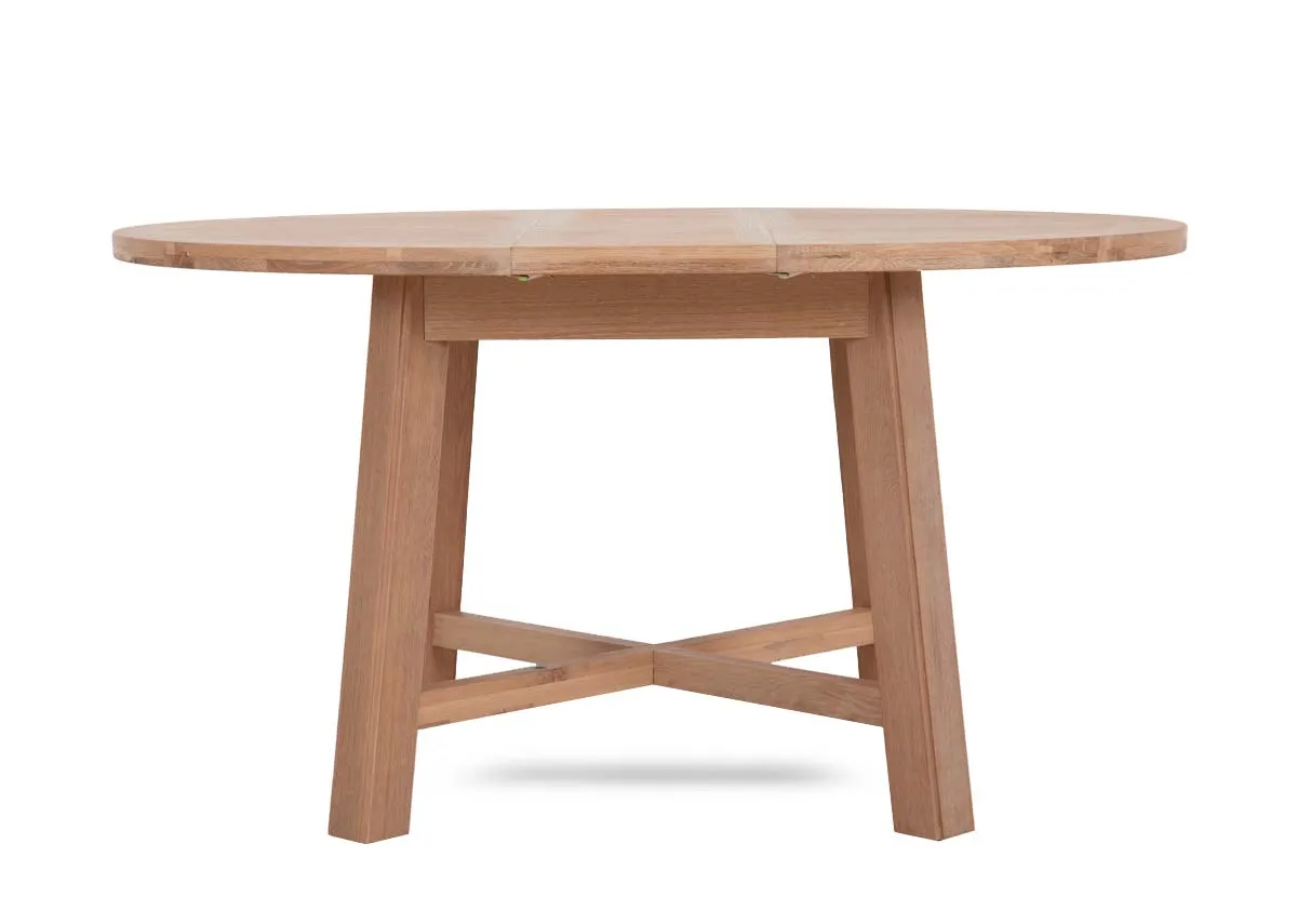 A round oak dining table from EZ Living Furnitures Albany range.Front view of tabletop as oval option.