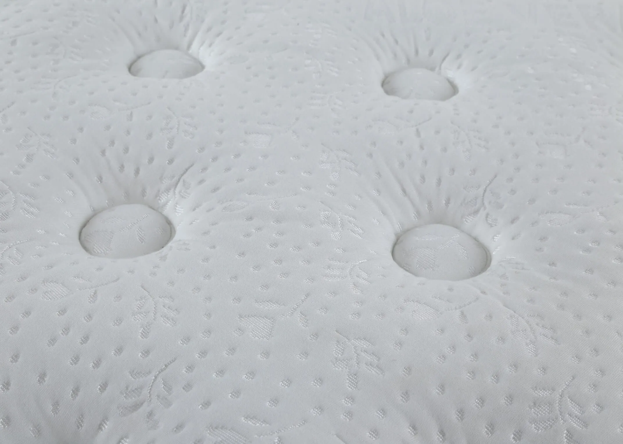 A lifestyle image featuring the Emilys Dream Aloe Vera mattress in a bedroom setting.