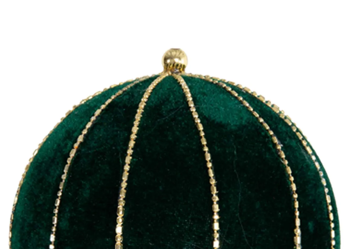 A green velvet round bauble from EZ Livings Christmas range. Closeup of gold bead on top.