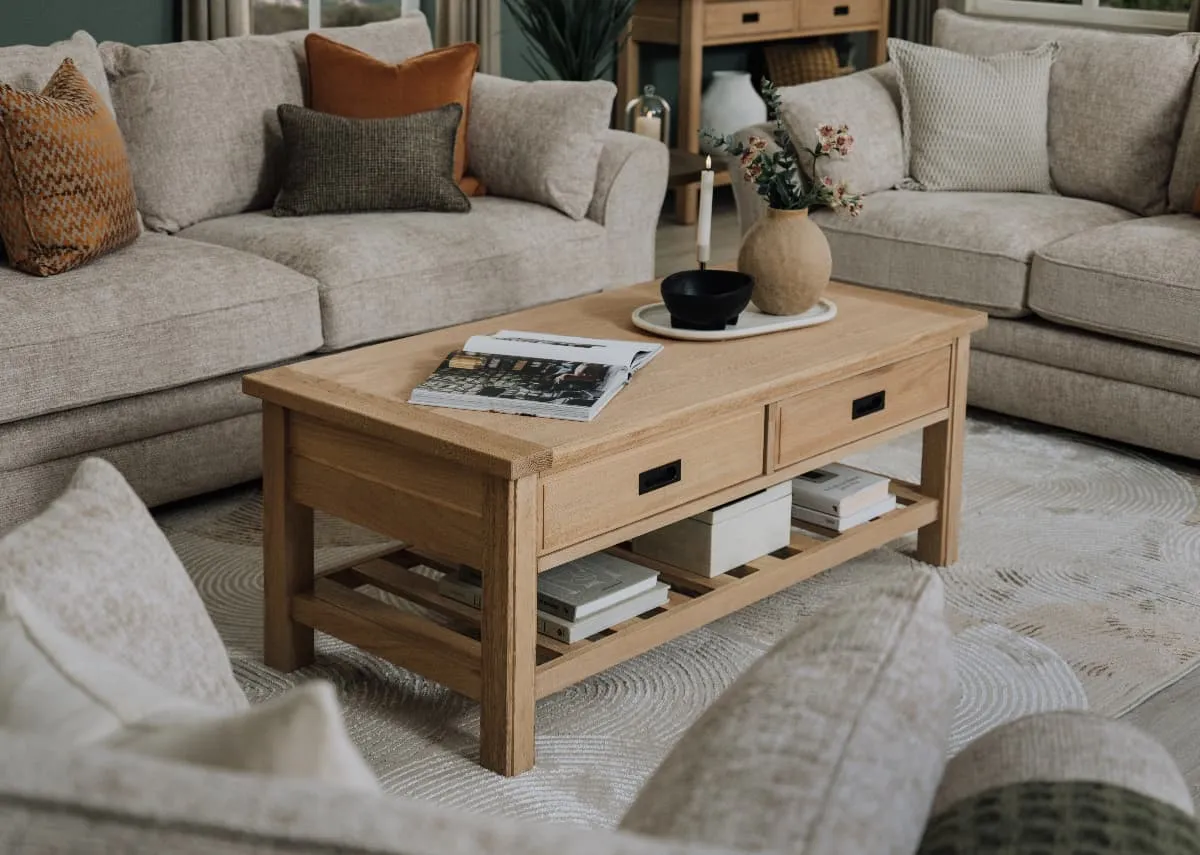 A lifestyle image of the Albany Coffee Table with Skyline sofas.