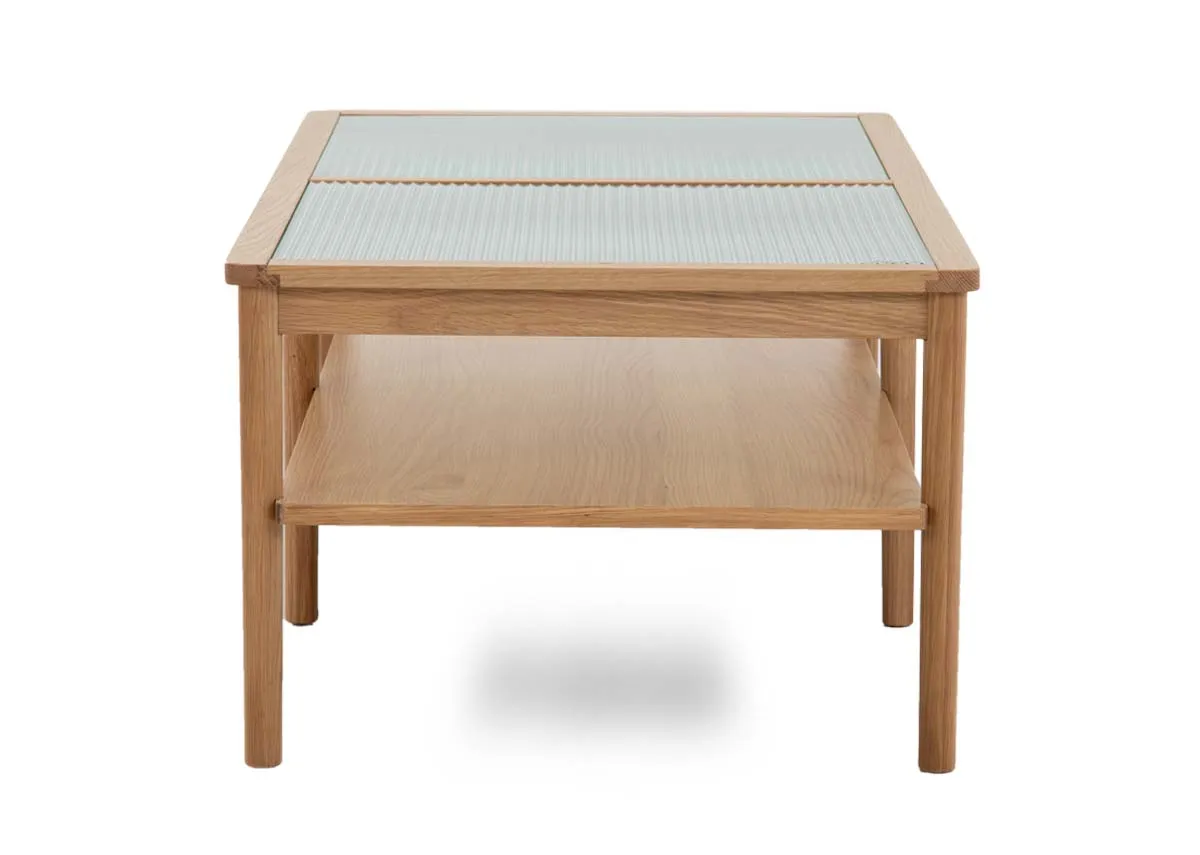 An oak coffee table with glass top from EZ Livings Gallina range. Side view