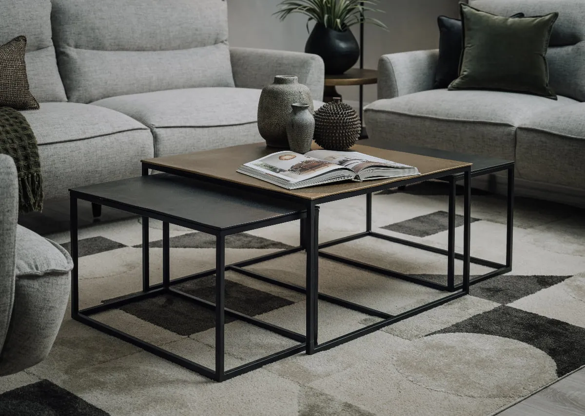 A lifetsyle image of the Joyo Nest of 3 Tables with the Cameron sofa.