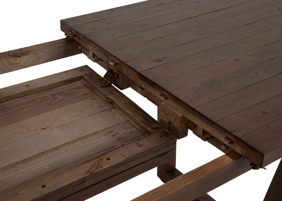 A cashew reclaimed wood dining table from EZ Livings Ladder range. Closeup of leaf hidden under the table.
